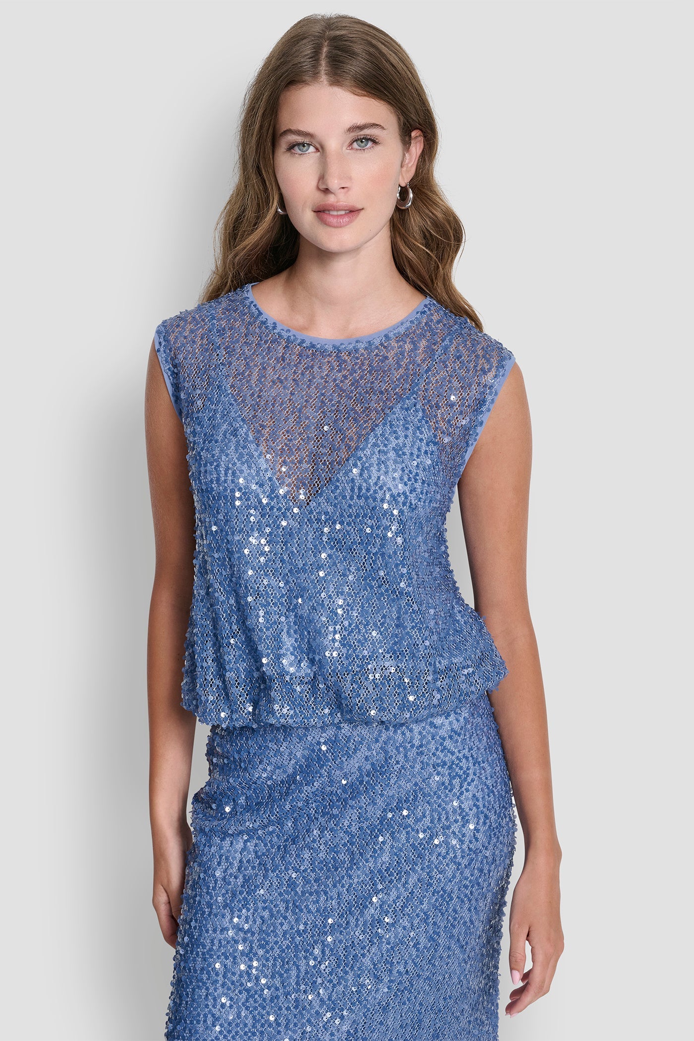 SLEEVELESS SEQUINED BUBBLE HEM SWEATER